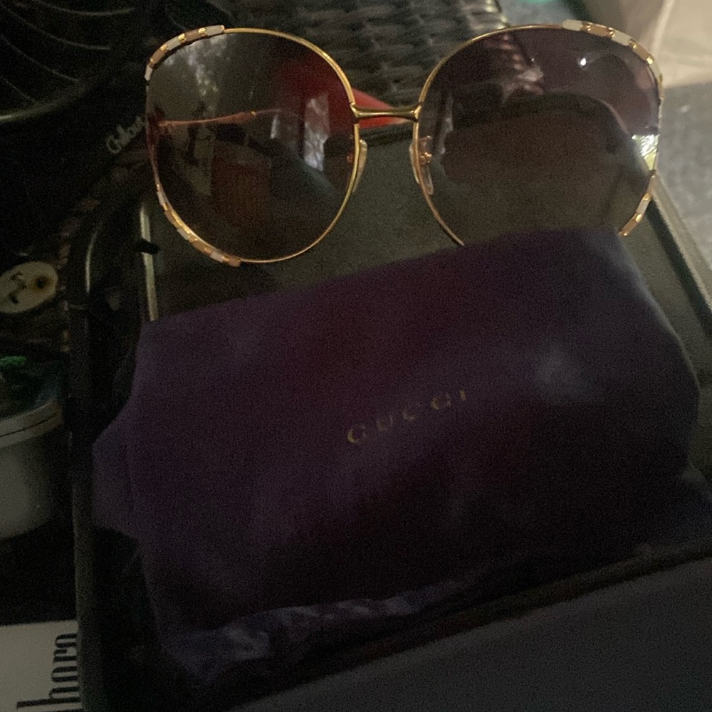 Pair of lightly used Gucci sunglasses w bag and case great condition